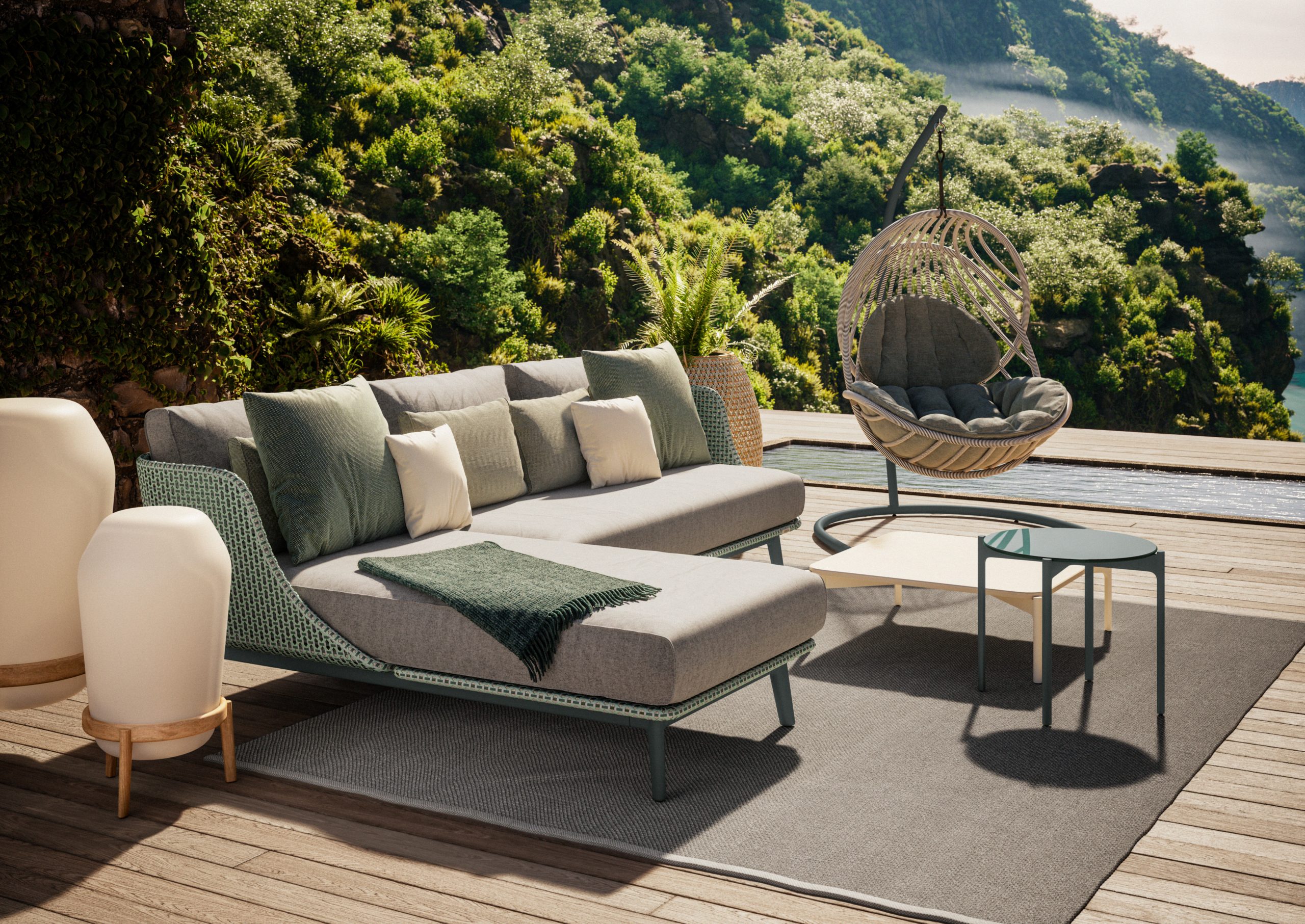 A modern orange woven deck lounge chair in a beautiful desert scene